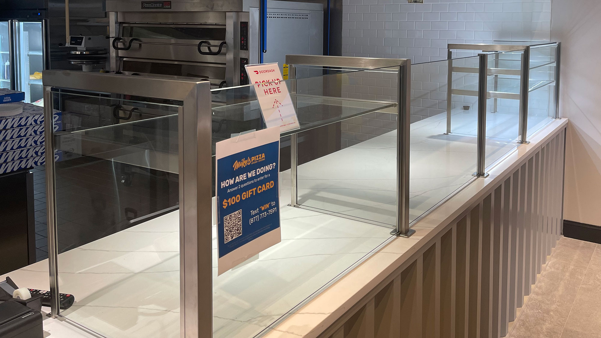 Satin stainless steel food shields with LED lights | Mike’s Pizza Kitchen - Parlin, NJ